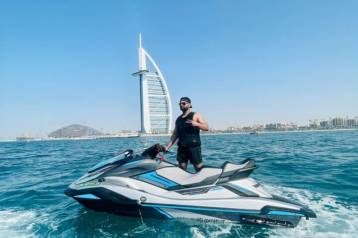 Experience the allure of Dubai's coastline as you ride a jet ski towards the iconic Burj Al Arab. Capture unforgettable moments and enjoy the refreshing sea breeze.
